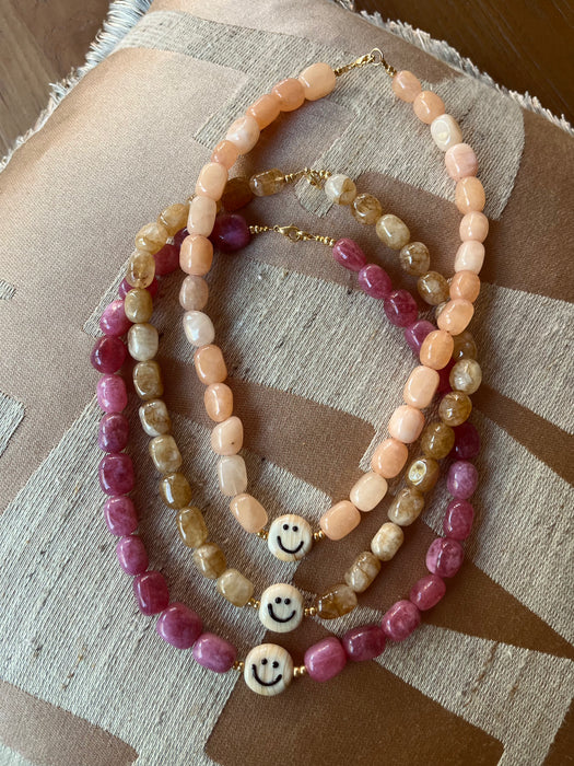 Beige smiley necklace