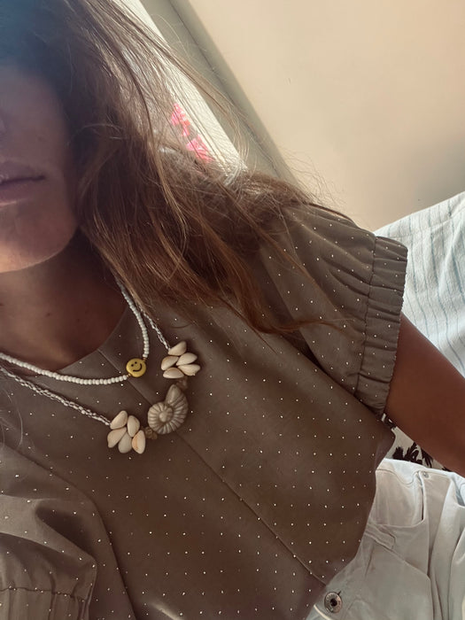 White smiley necklace