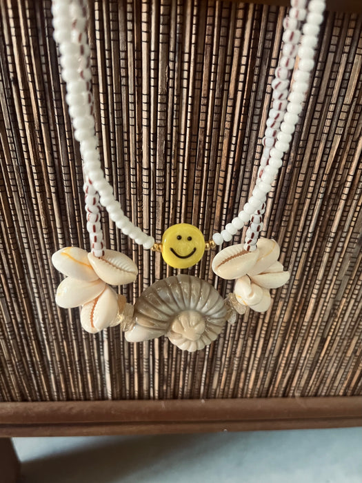 White smiley necklace