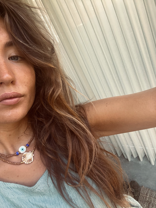 White eye necklace